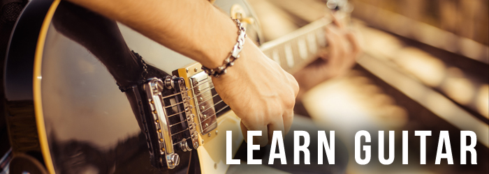 Man playing a guitar